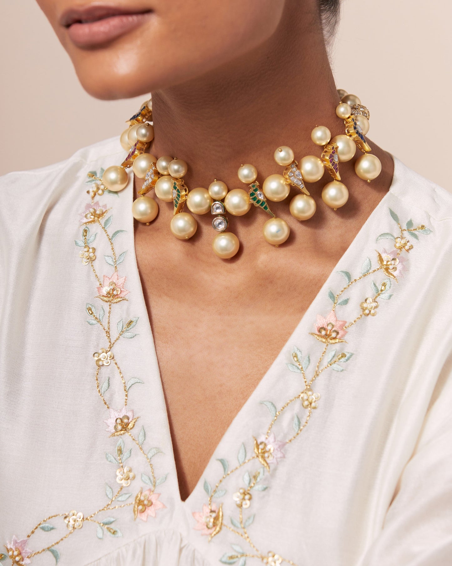 Colorful birds with pearls