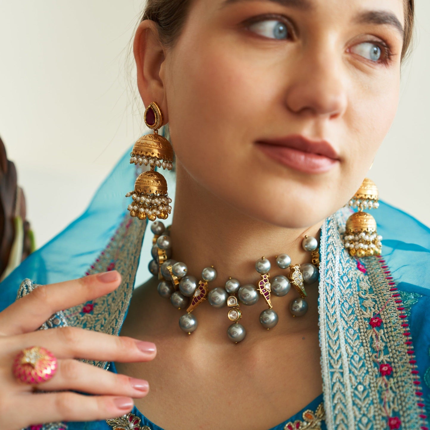 Colorful birds with pearls