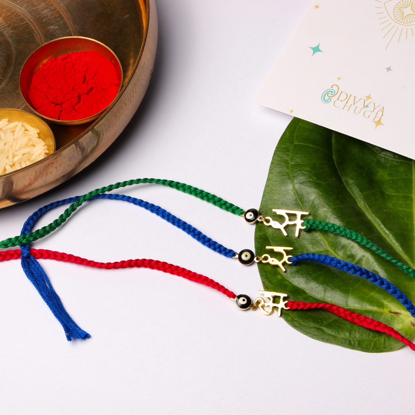 Initial with Evil Eye Rakhi